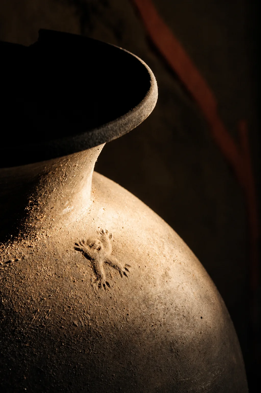 The Monkey Pot, a 1,000-year-old Maya ceramic vessel marked with a monkey-faced glyph, inside the ATM Cave, Belize