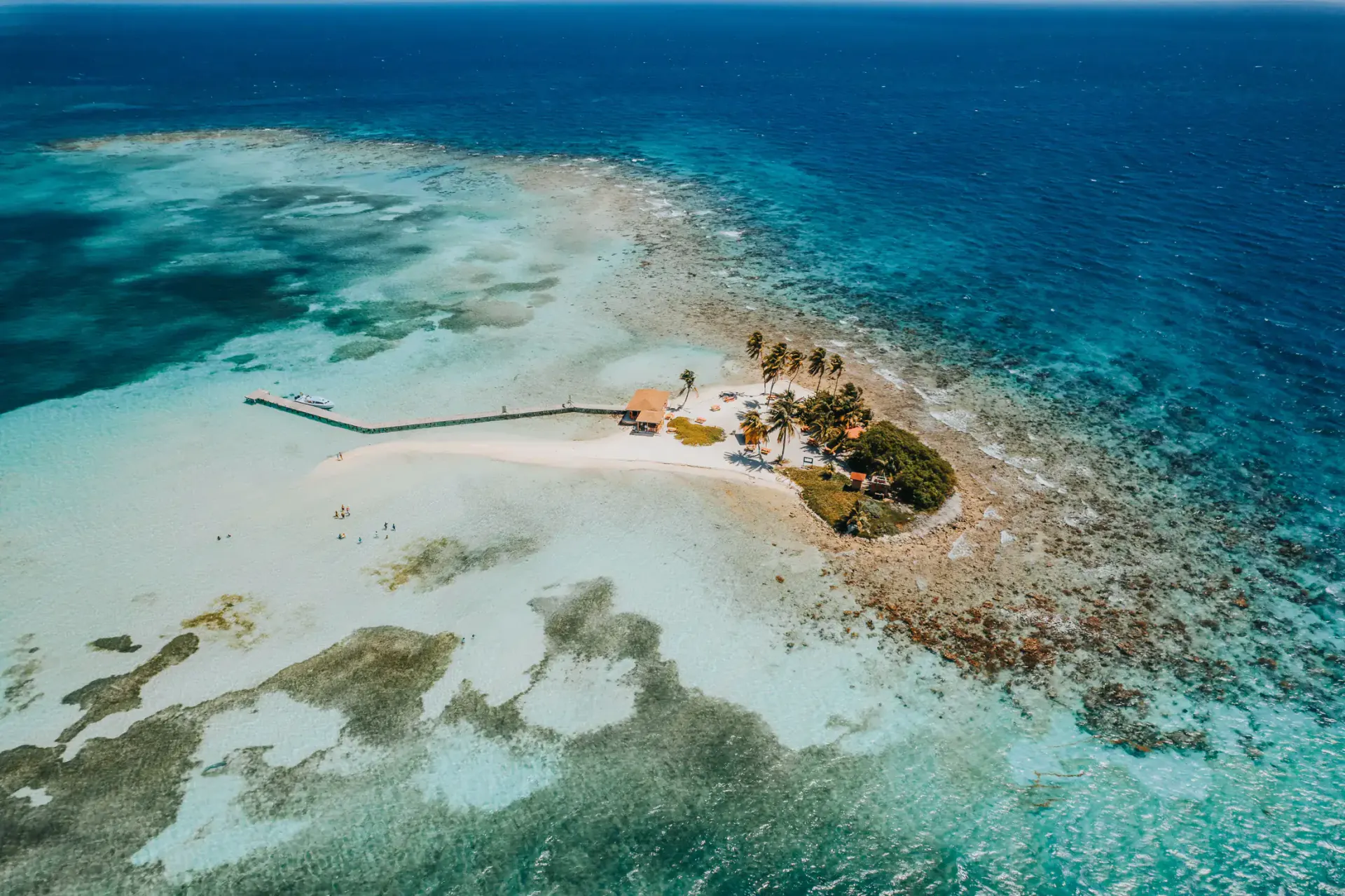 Belize travel scene featuring Belize islands and cayes aerial reef view