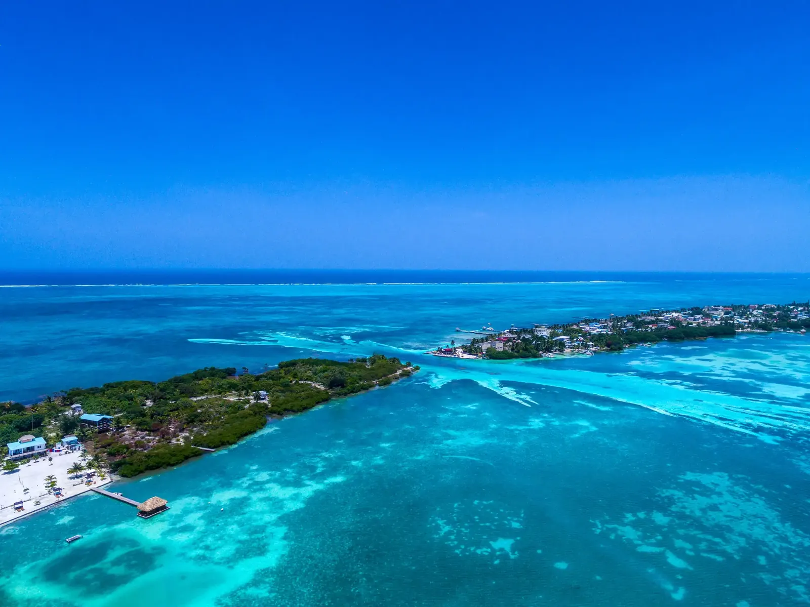 Aerial view of The Split on Caye Caulker with sheltered turquoise water
