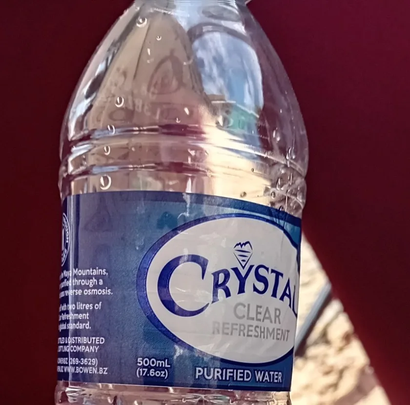 500 mL bottle of Crystal purified water, bottled in Belize by Bowen and Bowen