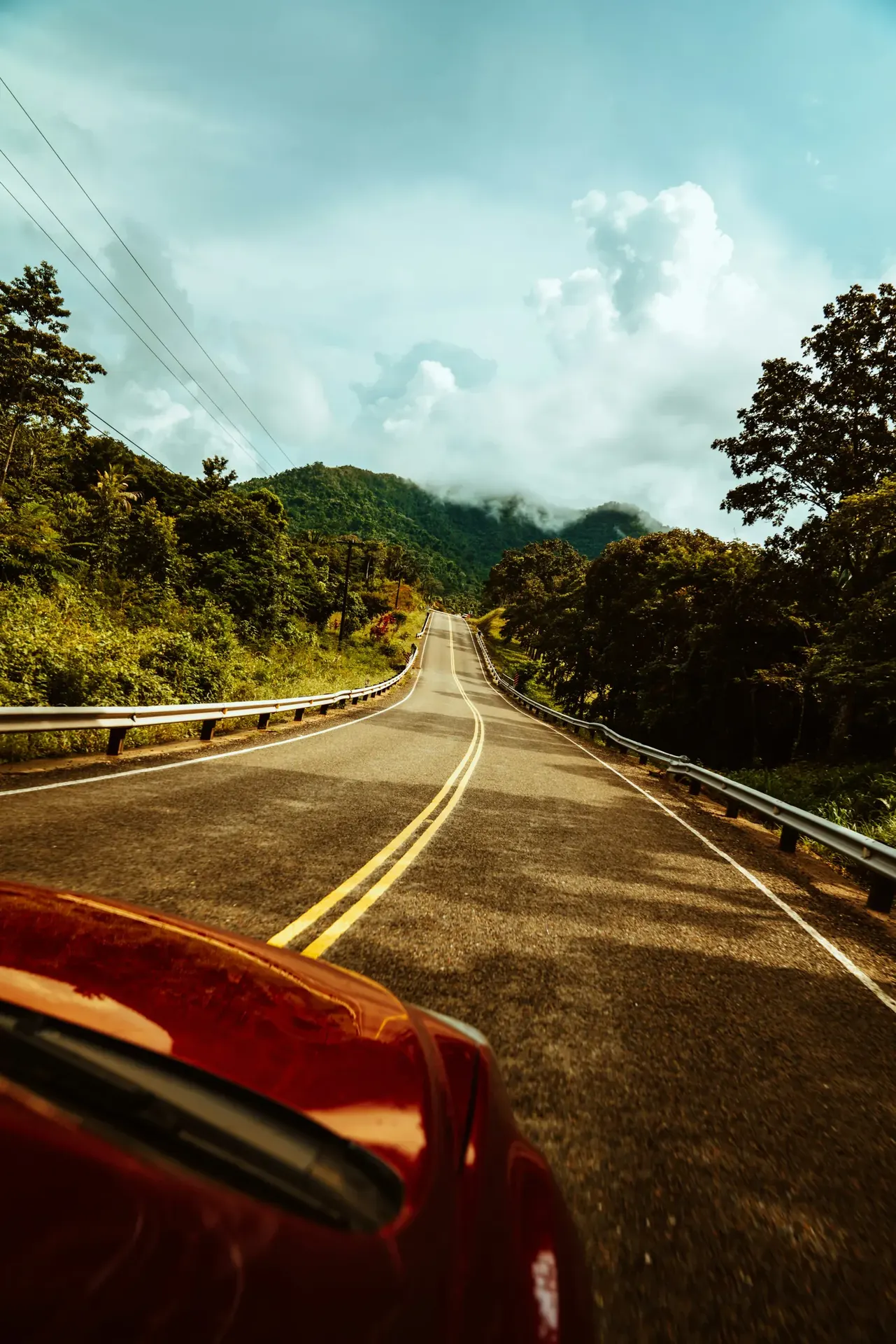 Belize travel scene featuring Sedan vs 4WD SUV