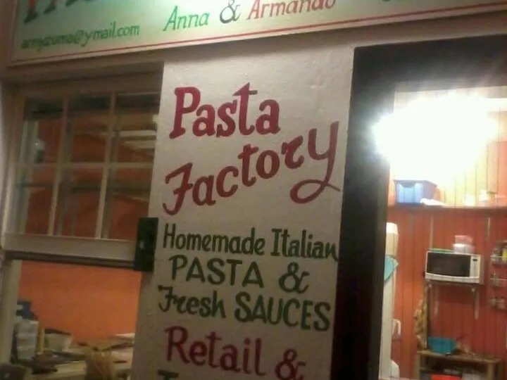 Belize travel scene featuring Pasta Per Caso Anna & Armando