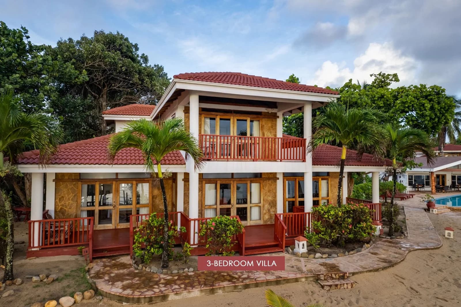 Oceanfront 3-bedroom villa exterior at Belizean Dreams Resort, Hopkins, Belize