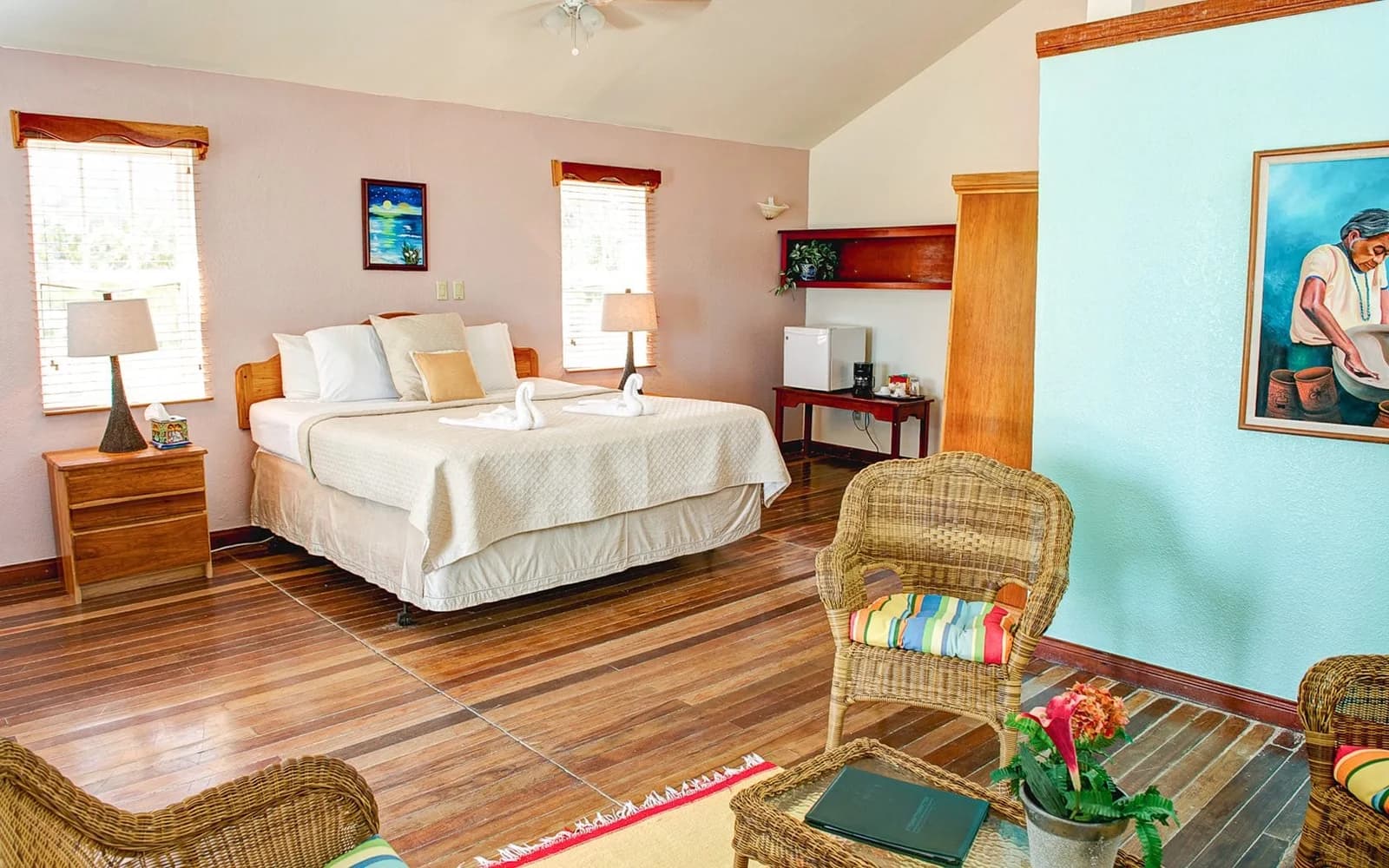 Superior Cabana bedroom at Blackbird Caye Resort