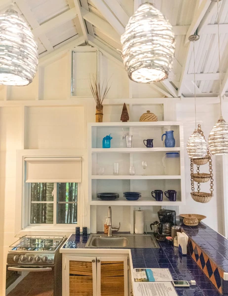 Full kitchen with vaulted wood ceiling in a suite at Caribbean Beach Cabanas