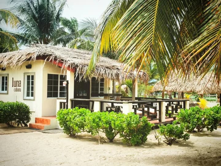 Belize travel scene featuring Caribbean Beach Cabanas in Placencia