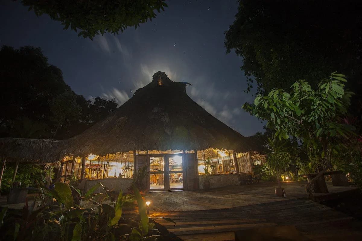 Cotton Tree Lodge jungle resort grounds surrounded by rainforest at the foot of the Maya Mountains, Belize