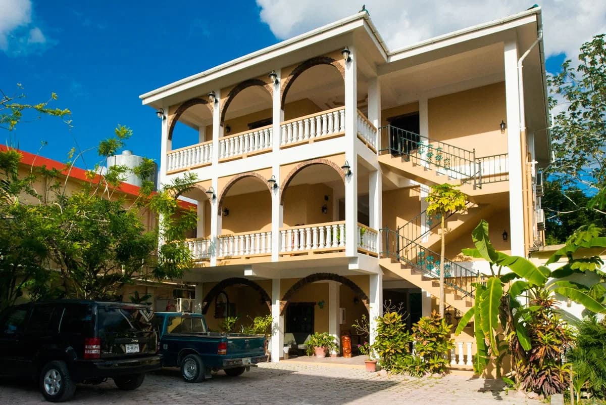 Rear compound and parking courtyard of Hotel de la Fuente in Orange Walk Town, Belize