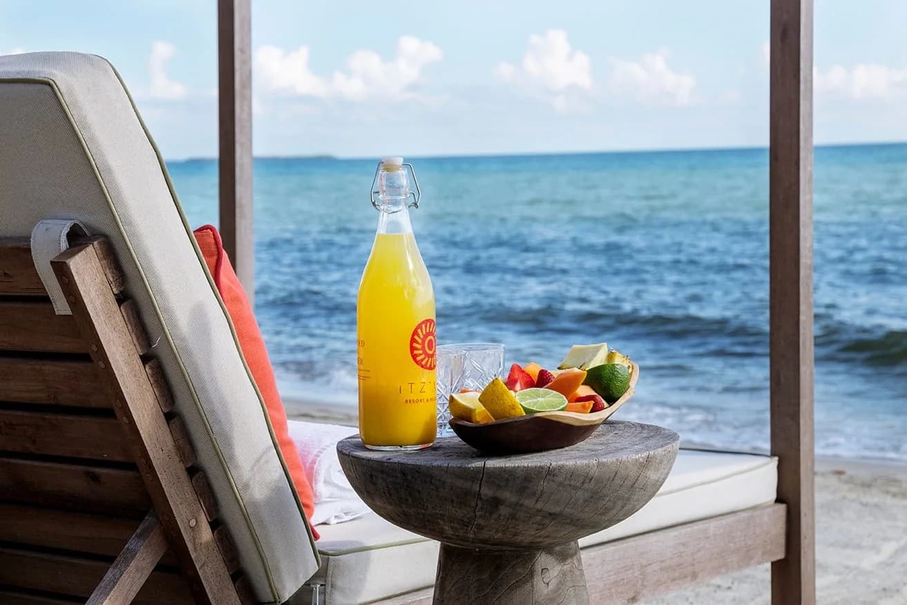 Fresh juice and fruit served beachside at Itz'ana Resort & Residences, Placencia, Belize