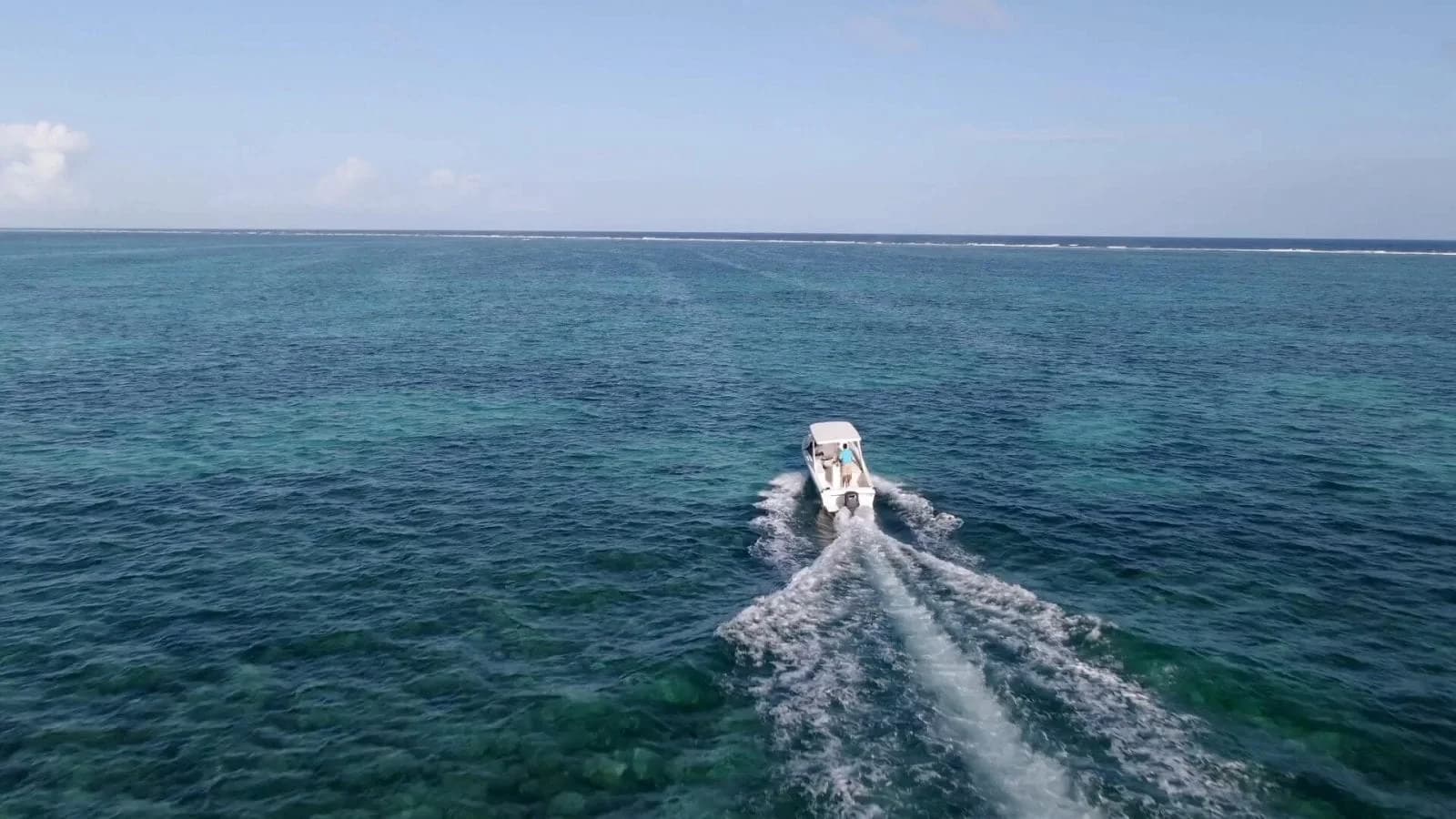 Guests enjoying reef and beach experiences near Matachica Resort & Spa, Ambergris Caye, Belize