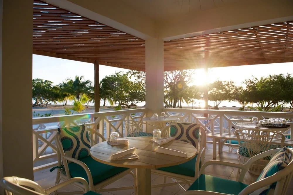 Sunset dining terrace at the Beach Bar and Grill, Naia Resort and Spa, Placencia, Belize
