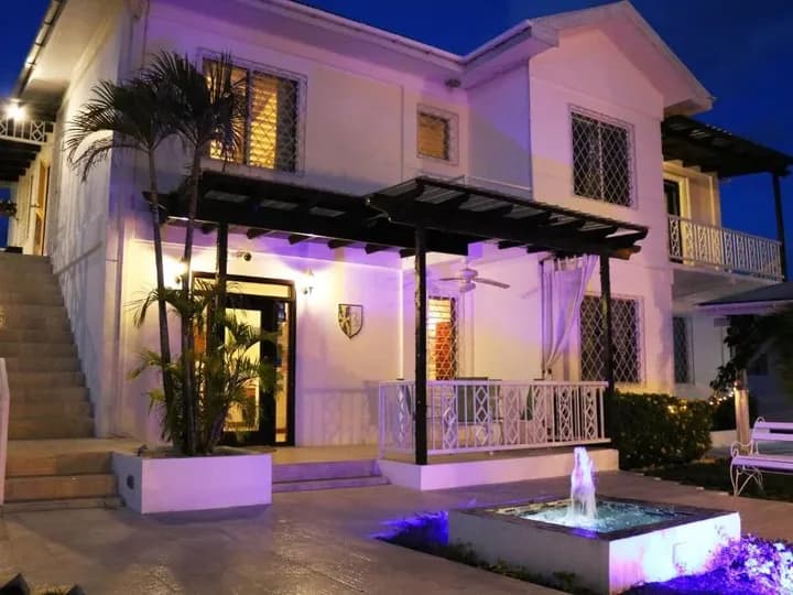 Belize travel scene featuring Villa Boscardi in Belize City