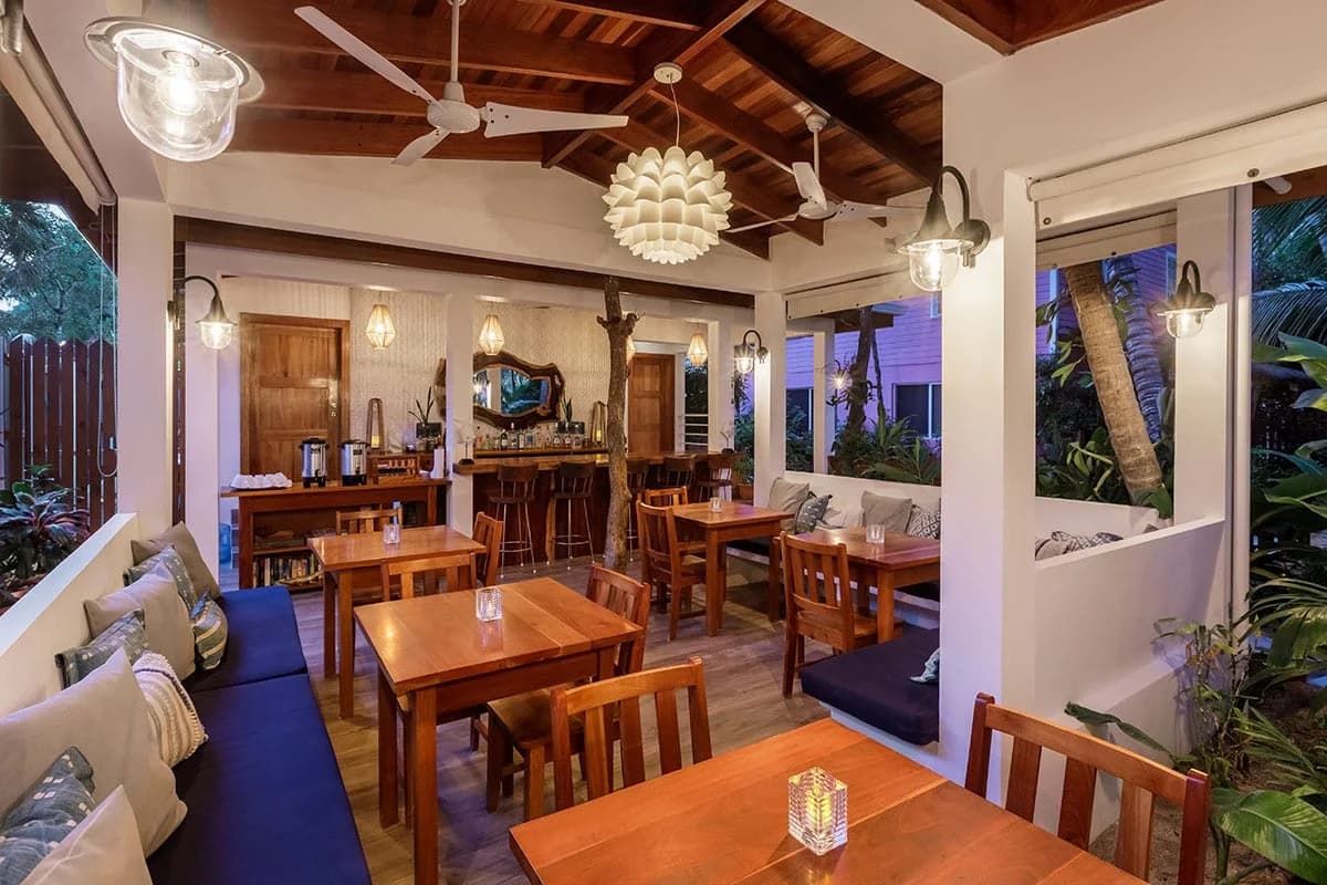 Open-air dining area at Weezie's Patio Cafe and Bar, Caye Caulker, Belize