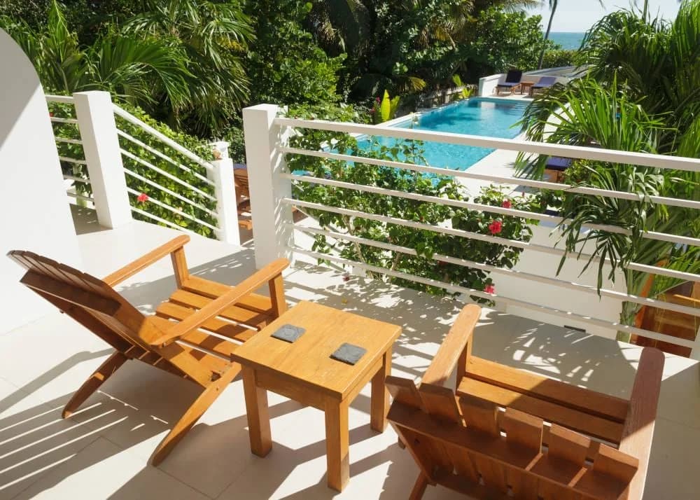 Ocean view from a guest room porch at Weezie's Ocean Front Hotel, Caye Caulker, Belize