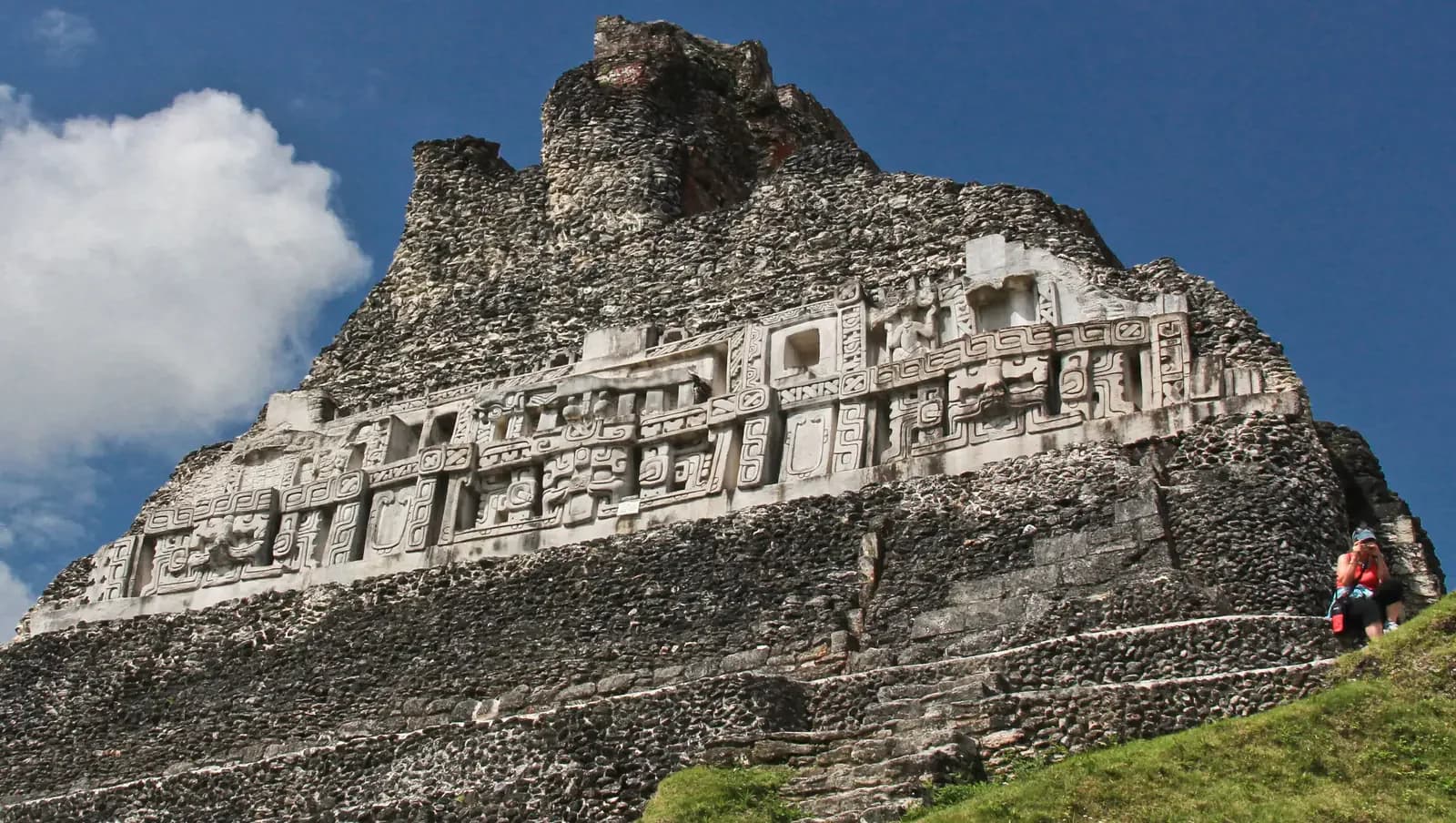 The carved stucco frieze near the top of El Castillo