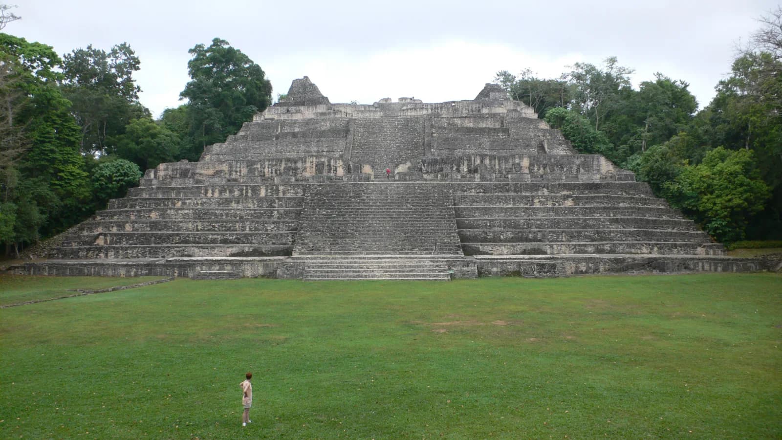 Wide frontal view of Caana rising above the main plaza at Caracol, Belize.